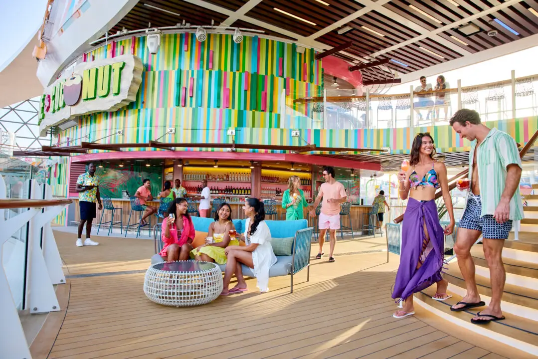 People enjoying drinks at Royal Caribbean's Lime & Coconut bar